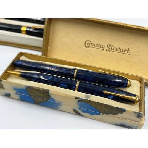 1305 - Two vintage boxed writing instrument sets, one Waterman's fountain pen with 14ct gold nib and propel... 