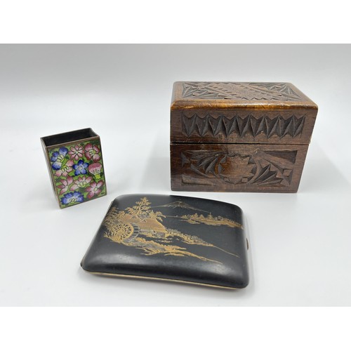 1306 - Three items, one Japanese Komai style damascene cigarette case, one copper and enamel matchbox holde... 