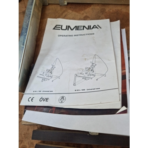 833 - A Eumenia Universal 240v radial arm saw with instruction manuals