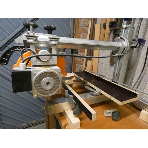 833 - A Eumenia Universal 240v radial arm saw with instruction manuals