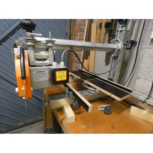 833 - A Eumenia Universal 240v radial arm saw with instruction manuals