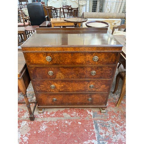 118 - A Waring & Gillow Ltd. walnut chest of four drawers, patent no. 224089 - approx. 102cm high x 92cm w... 