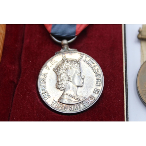 1142 - Two Elizabeth II medals, one boxed Imperial Service presented to Katie Ruby Renie Smith and one Spec... 