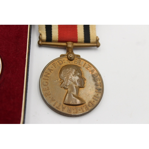 1142 - Two Elizabeth II medals, one boxed Imperial Service presented to Katie Ruby Renie Smith and one Spec... 