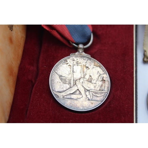 1142 - Two Elizabeth II medals, one boxed Imperial Service presented to Katie Ruby Renie Smith and one Spec... 