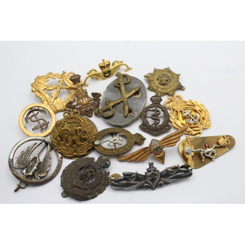 1148 - Fifteen military cap badges to include French, Submarines, Australian etc.