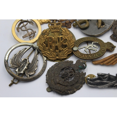 1148 - Fifteen military cap badges to include French, Submarines, Australian etc.