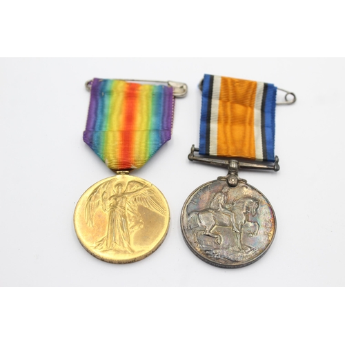 1152 - A WWI medal pair with original ribbons presented to 6090 PTE. G. H. Cook 7-Lond.R.