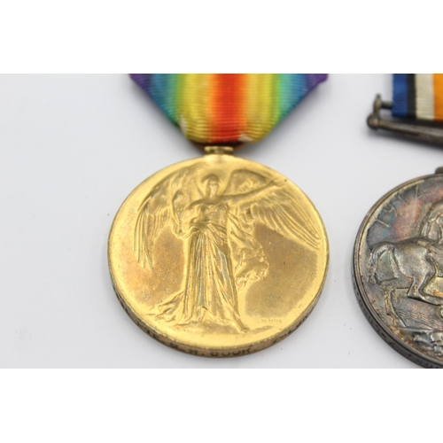 1152 - A WWI medal pair with original ribbons presented to 6090 PTE. G. H. Cook 7-Lond.R.