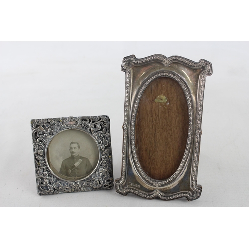 1188 - Two Edwardian hallmarked sterling silver photograph frames - approx. gross weight 298 grams