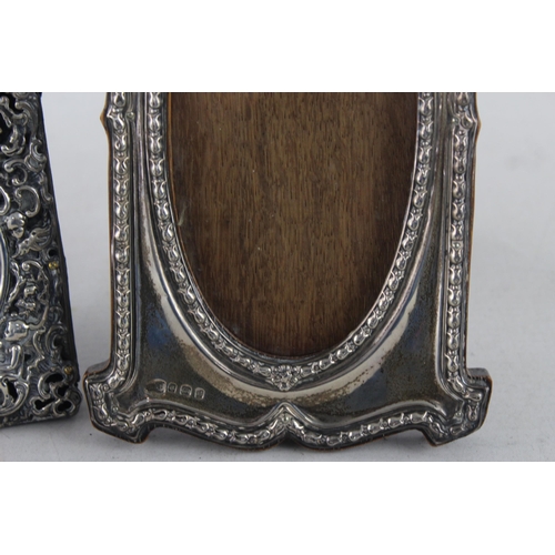 1188 - Two Edwardian hallmarked sterling silver photograph frames - approx. gross weight 298 grams