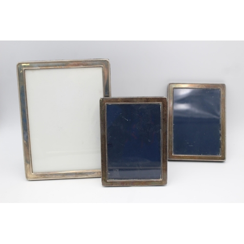 1189 - Three hallmarked sterling silver photograph frames - approx. gross weight 674 grams