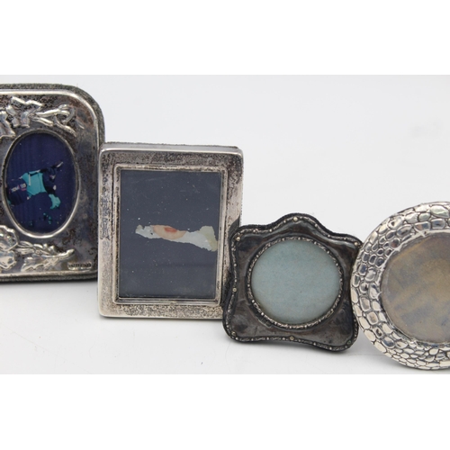 1198 - Four hallmarked sterling silver photograph frames - approx. gross weight 139 grams