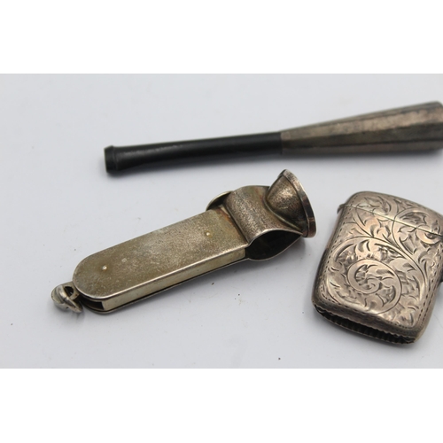 1207 - Three pieces of hallmarked sterling silver, one cigar cutter, one cheroot holder and one vesta case ... 