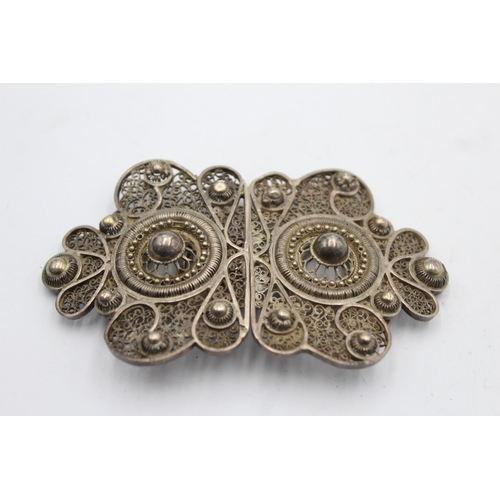 1209 - An antique sterling silver women's filigree belt buckle - approx. gross weight 39 grams and 10cm wid... 