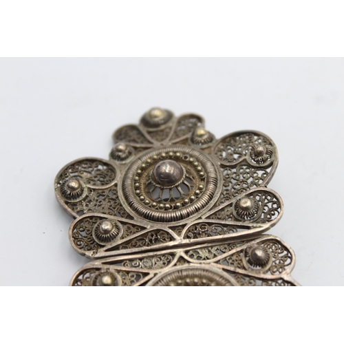 1209 - An antique sterling silver women's filigree belt buckle - approx. gross weight 39 grams and 10cm wid... 