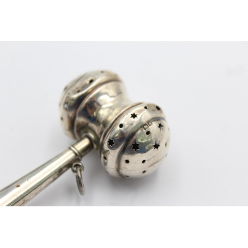 1216 - A Crisford & Norris hallmarked Birmingham sterling silver baby rattle - approx. gross weight 19 gram... 