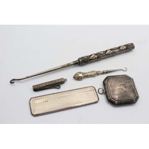 1217 - Five hallmarked sterling silver vanity items to include comb, compact mirror etc. - approx. gross we... 