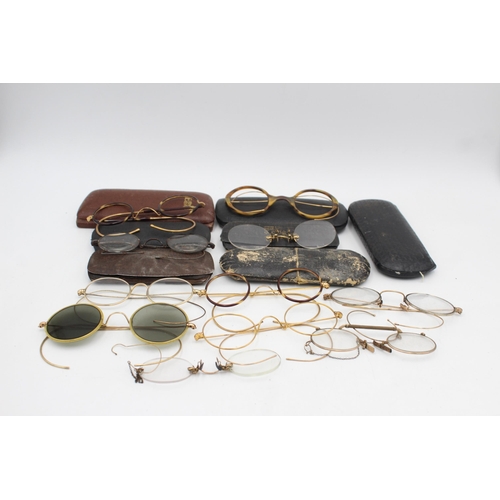 1221 - A collection of antique and vintage spectacles