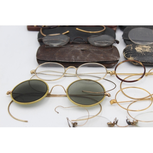 1221 - A collection of antique and vintage spectacles