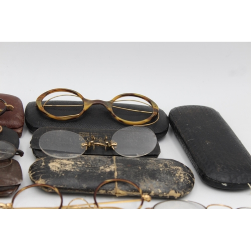 1221 - A collection of antique and vintage spectacles