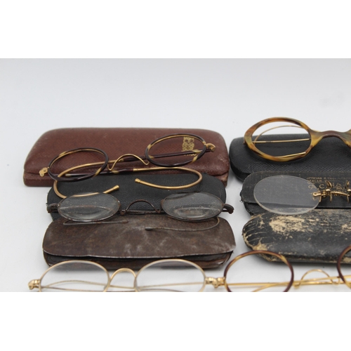 1221 - A collection of antique and vintage spectacles