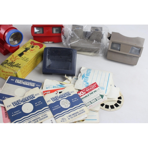 330 - A large collection of vintage view finders to include Fisher-Price, Argus Pre-Viewer etc.