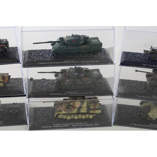 332 - Fifteen boxed diecast model tanks to include AMX-30B, KV-1E, Type 61 etc.