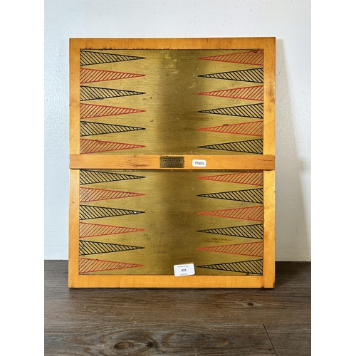 343 - A mid 20th century backgammon board made for Harrods Ltd. by R. P. Products of Huddersfield