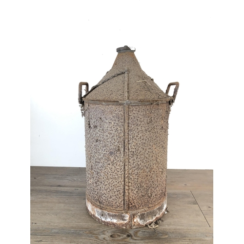 297 - A vintage metal oil can - approx. 55cm high