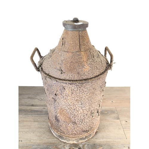 297 - A vintage metal oil can - approx. 55cm high