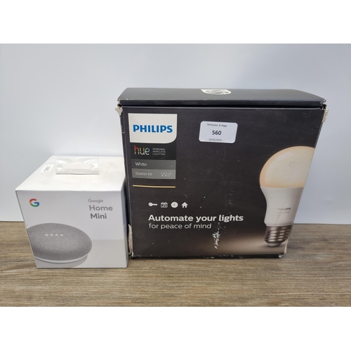 560 - Two items, one sealed Google Home Mini smart speaker and one Phillips Hue white light-automation sta... 