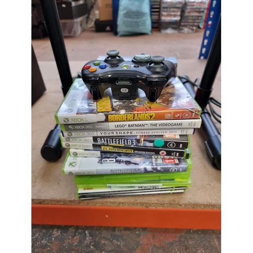 578 - A Microsoft Xbox 360 120GB Elite games console with Rock Band drum set and various games