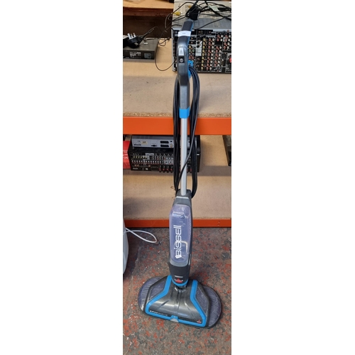 666 - A Bissell Spinwave steam mop