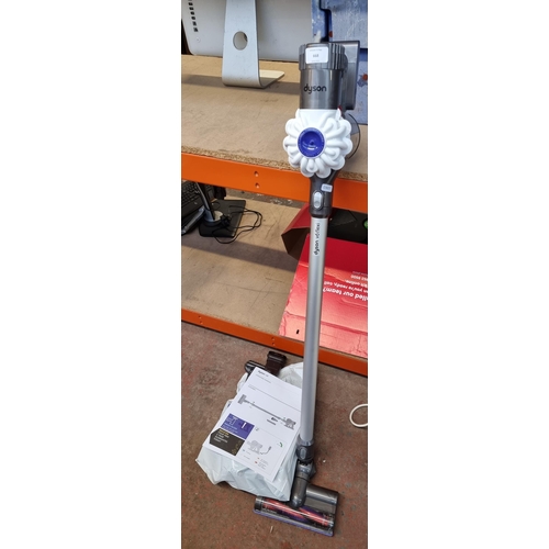 668 - A Dyson V6 Flexi vacuum cleaner with accessories