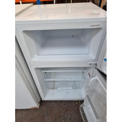 680 - A Russell Hobbs under-counter fridge freezer - approx. 49cm wide x 81cm high