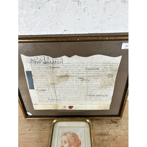 190 - Two gilt framed items, one mid 18th century indenture and one early 20th century portrait of a femal... 