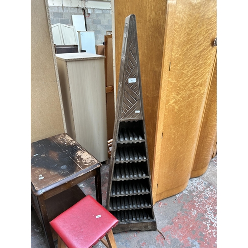 86 - A teak eight tier free standing open bookcase - approx. 143cm high x 171cm wide x 25cm deep