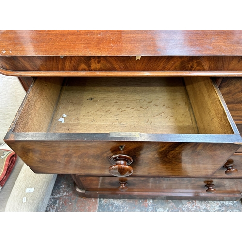 136 - A set of four walnut effect and black vinyl kitchen bar stools