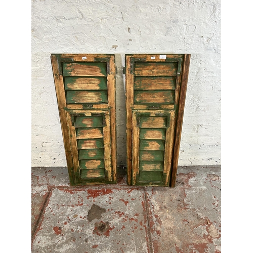154 - A pair of modern oak effect and blue painted bedside chests of two drawers - approx. 50cm high x 50c... 