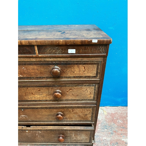 1 - A George III oak and mahogany crossbanded chest of two short over three long drawers - approx. 114cm... 