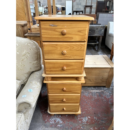 105 - A pair of modern pine bedside chests of three drawers - approx. 55cm high x 46cm wide x 43cm deep