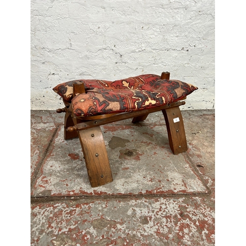 108 - A mid/late 20th century hardwood camel stool with cushion - approx. 39cm high x 40cm wide x 65cm lon... 