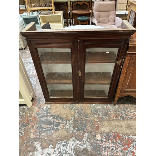 11 - A late 19th/early 20th century mahogany two door glazed bookcase top - approx. 97cm high x 93cm wide... 