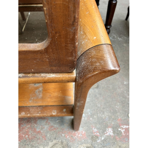 112 - Four 1970s teak occasional tables - largest approx. 50cm high x 49cm wide x 112cm long