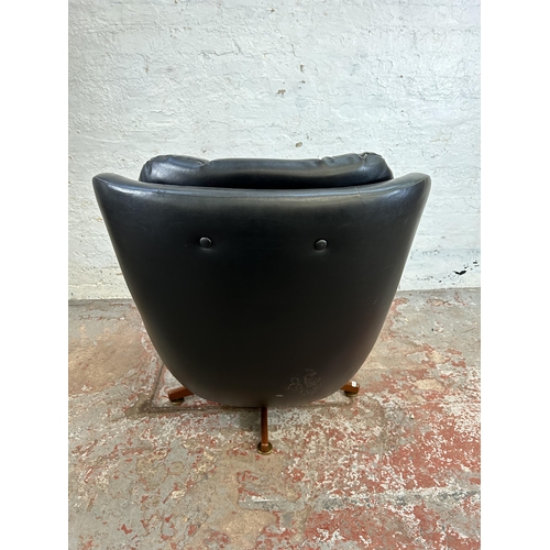74 - A mid 20th century black vinyl swivel armchair on teak base - approx. 95cm high x 88cm wide x 77cm d... 