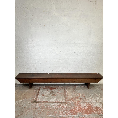 77 - A pine hallway bench - approx. 38cm high x 32cm deep x 250cm long
