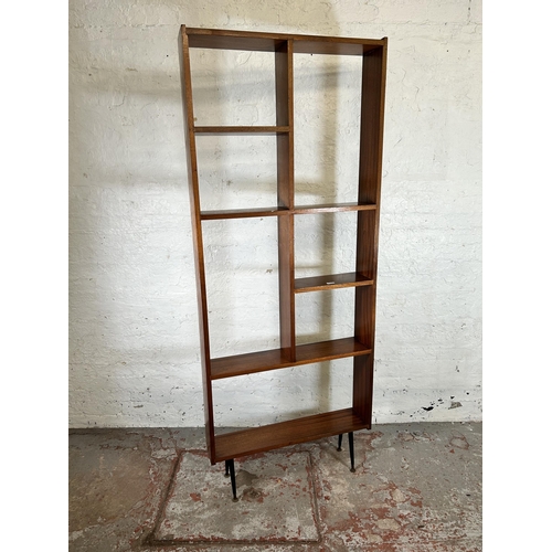 8 - A teak room divider with black painted splayed supports - approx. 207cm high x 84cm wide x 17cm deep
