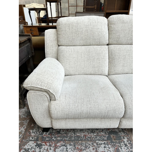 82 - A La-Z-Boy white fabric upholstered two seater sofa with black painted splayed supports - approx. 10... 