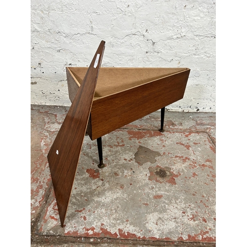 83 - A mid 20th century teak triangular storage side table with splayed supports - approx. 34cm high x 33... 